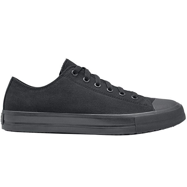 A black Shoes For Crews Delray casual shoe with laces.