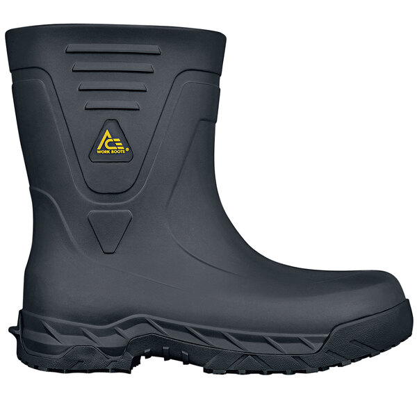 A black Shoes For Crews work boot with a yellow logo.