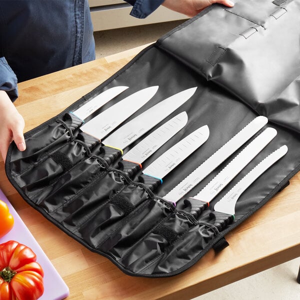 a group of knives on a table