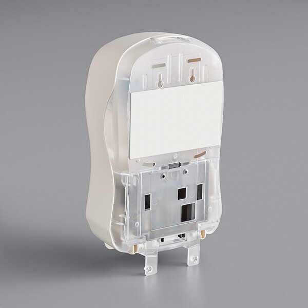 A white plastic Dial foaming hand soap and sanitizer dispenser.