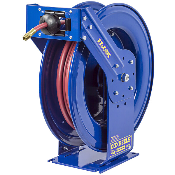 A blue Coxreels truck mount hose reel with a hose attached to it.