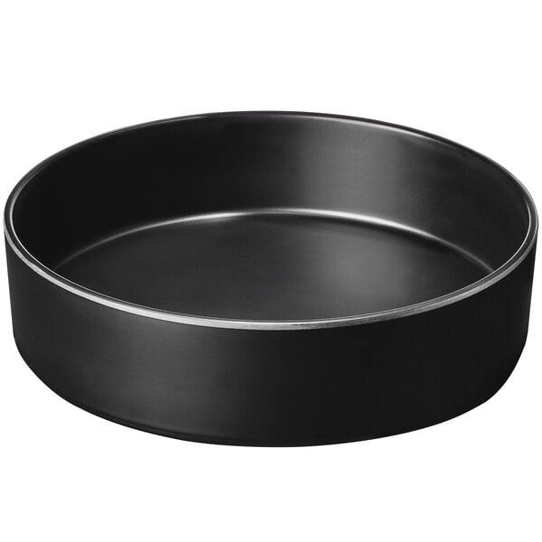 a black pan with a silver rim