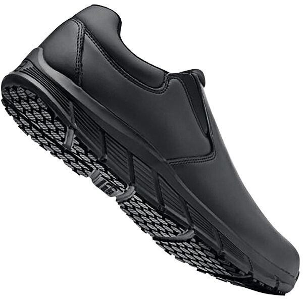 A pair of black Shoes for Crews Cater II non-slip shoes with a rubber sole.