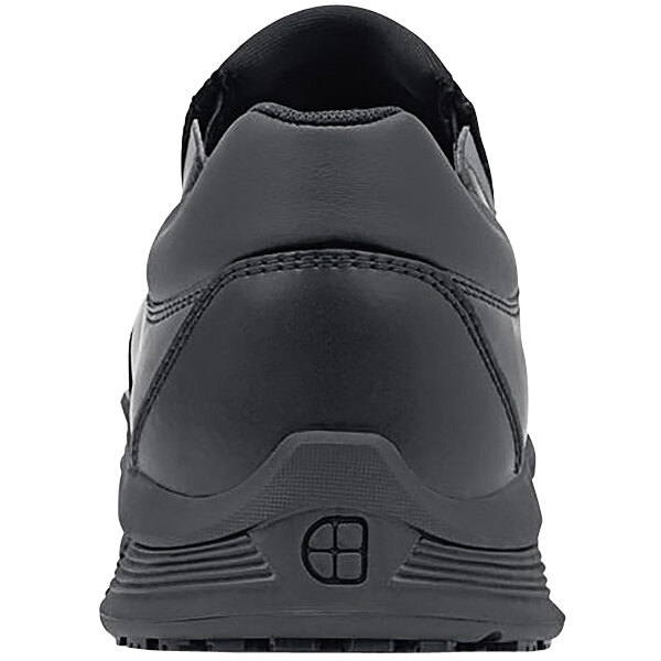 The back of a black leather Shoes for Crews Cater II non-slip shoe.