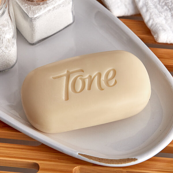 A bar of Dial Tone soap on a white background.