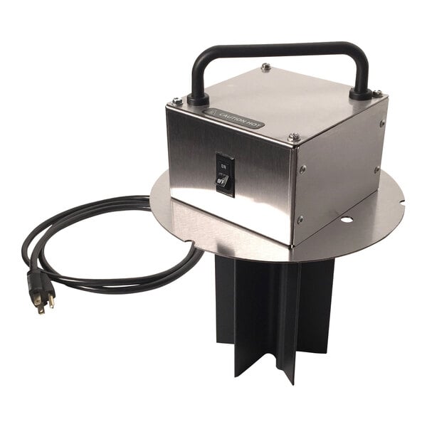 A Paragon caramel apple warming wedge, a metal box with a black cord.