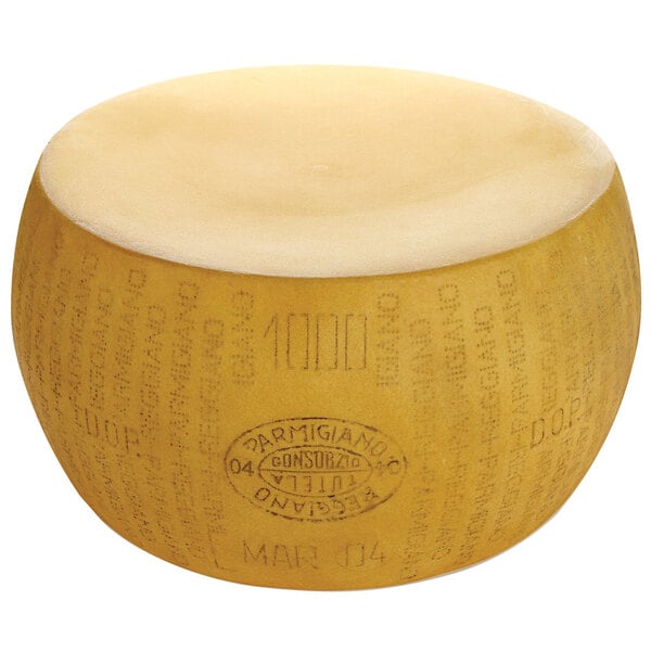 A round yellow cheese wheel with black text that reads "Parmesan Reggiano"