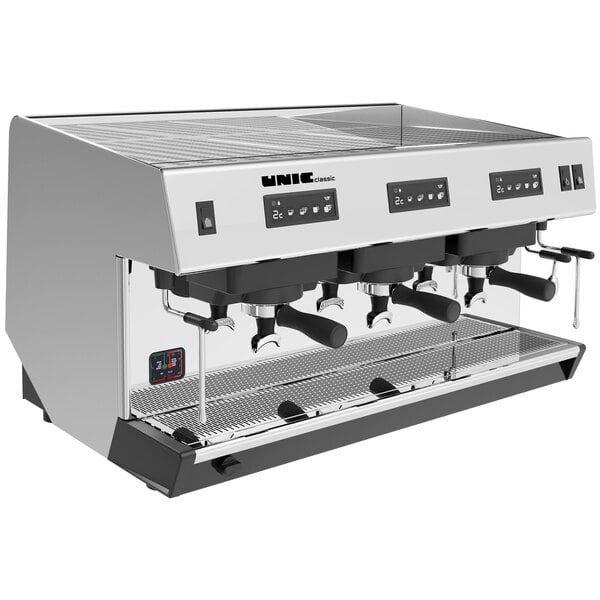 A silver and black Unic Classic 3 automatic espresso machine with four black handles.