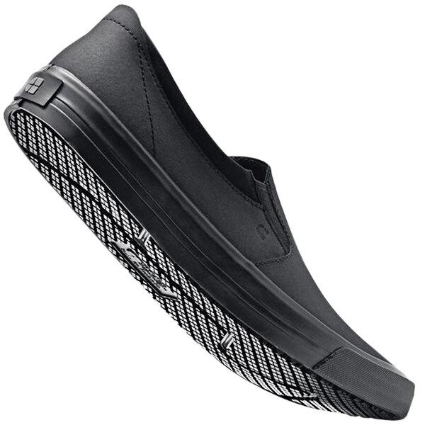 A black Shoes For Crews Ollie II unisex slip-on shoe with a white sole.
