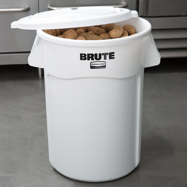 a white bucket full of potatoes