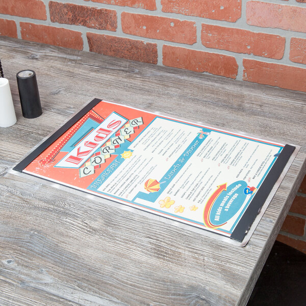 An Alumitique aluminum menu board on a table in a Mexican restaurant.