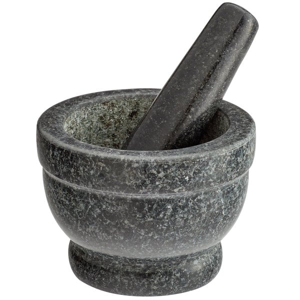 A Fox Run black granite mortar and pestle set.