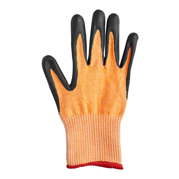 A close-up of a black and orange Mercer Culinary Millennia food processing glove.