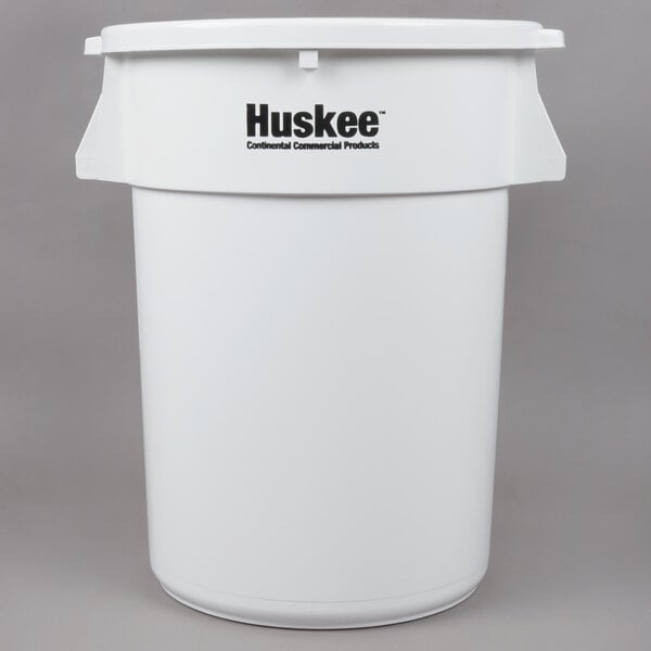 A white plastic Continental ingredient storage bin with a flat top lid and black text that reads "Huskee"