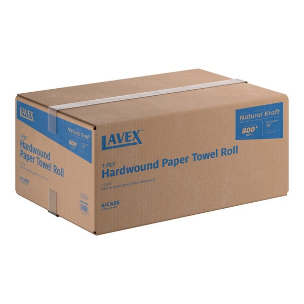 A cardboard case of Lavex 10-inch 1-ply natural kraft hardwound paper towel rolls, containing 6 rolls per case.