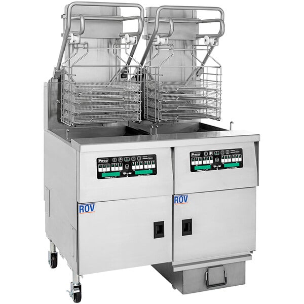 A Pitco Solstice electric floor fryer with baskets on wheels.