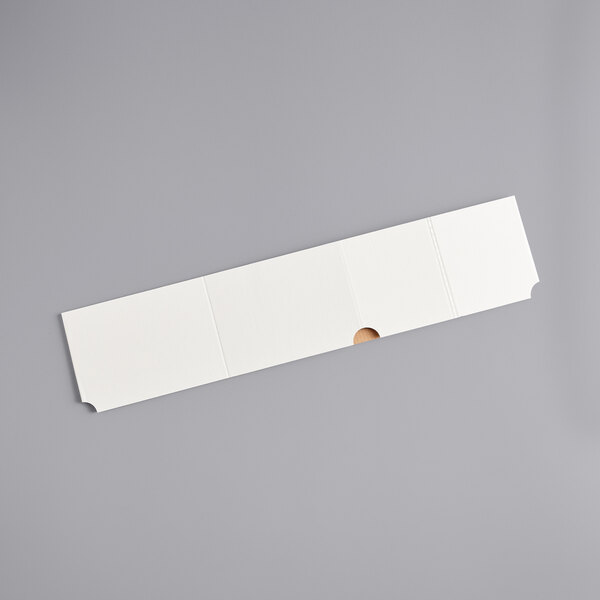A white rectangular object with a hole in the middle.