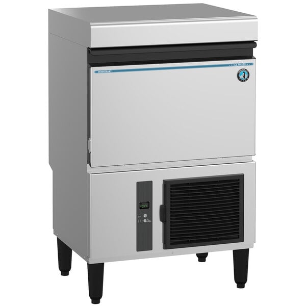 A large white Hoshizaki undercounter ice machine with a black vent.