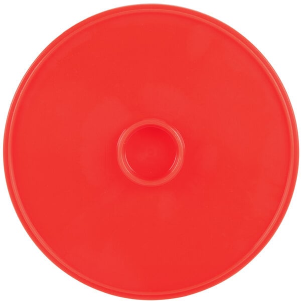A red plastic HS Inc. tortilla server lid with a hole in the center.