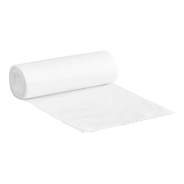 A roll of clear plastic Lavex Hercules trash bags on a white surface.