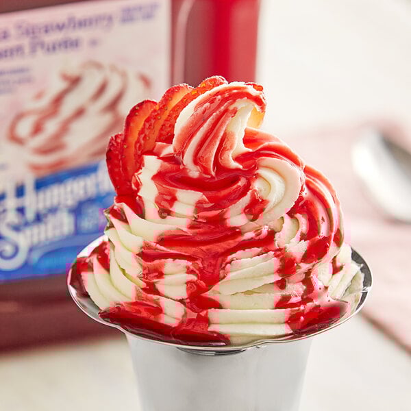 A cup of frozen yogurt with J. Hungerford Smith Fiesta Strawberry Puree