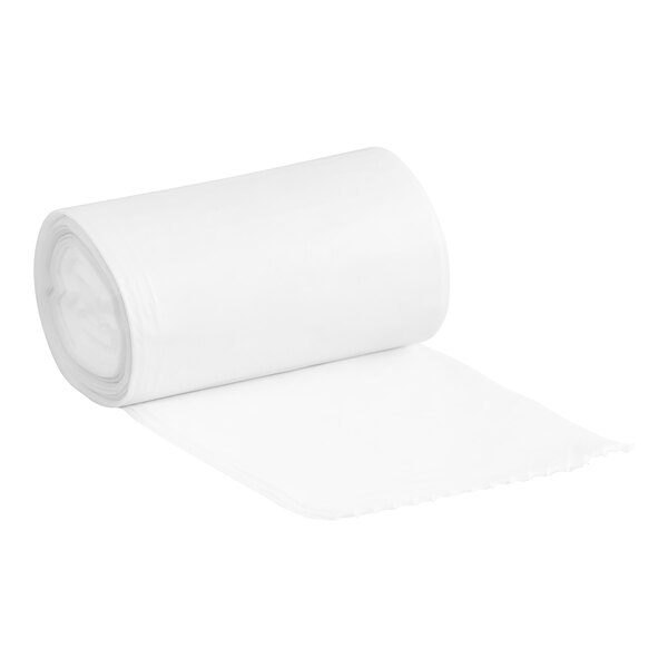 A roll of clear plastic trash bags on a white surface.