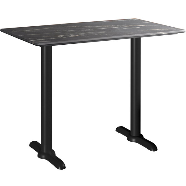 A Lancaster Table & Seating rectangular counter height table with black legs and a black top.