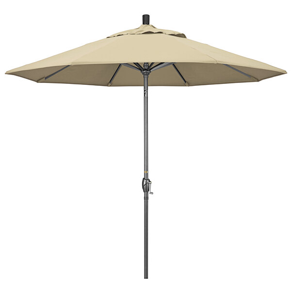 A beige California Umbrella on a hammertone aluminum pole.