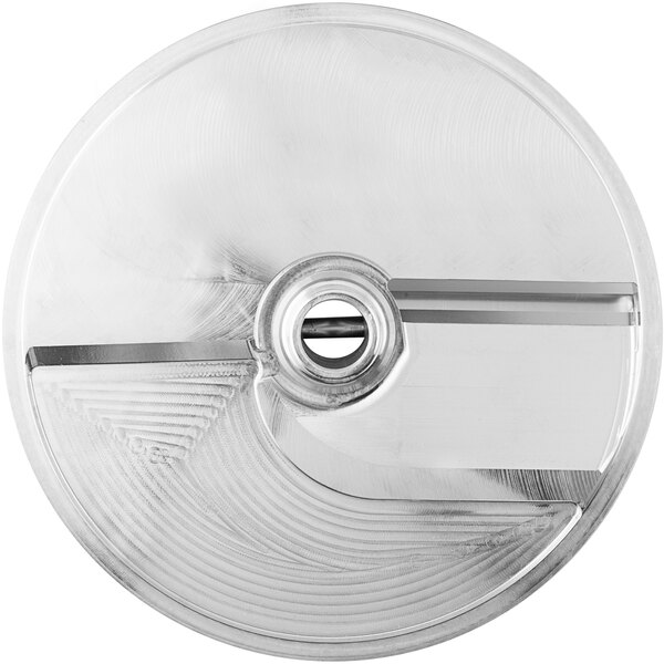 A circular silver metal Nemco soft slicing disc with a hole in the center.