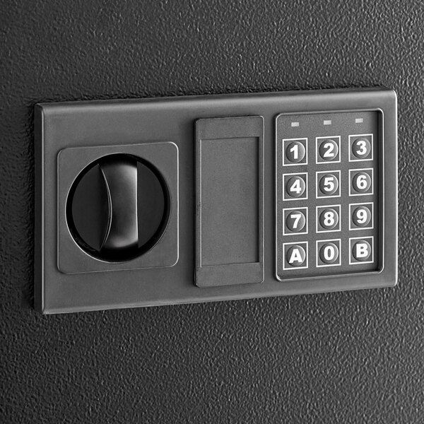 A black steel wall mount 133-key cabinet safe with electronic keypad lock.