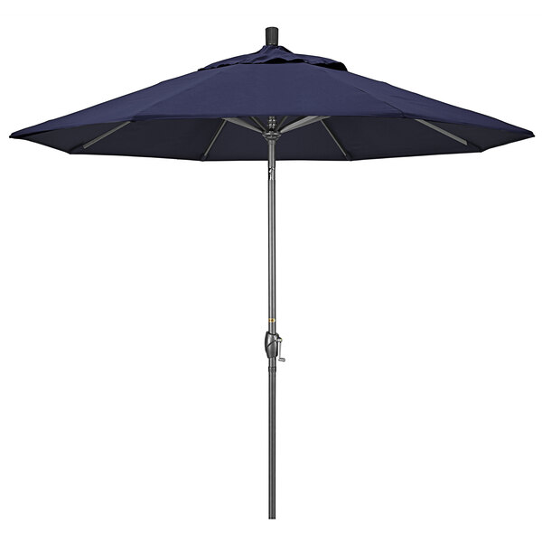 A navy blue California Umbrella on a hammertone aluminum pole.