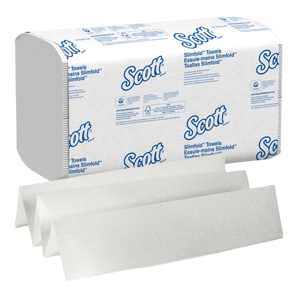 A pack of Scott Control Slimfold paper hand towels with several unfolded towels displayed in front.