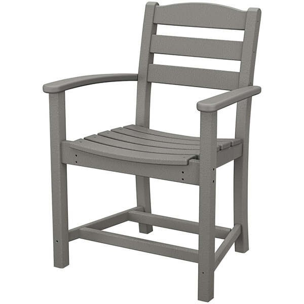 a grey chair with armrests