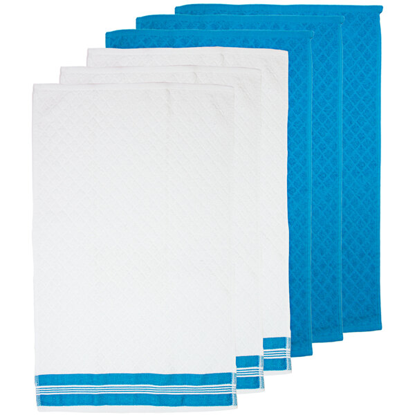 A stack of white and blue Monarch Brands terry kitchen towels with blue stripes.