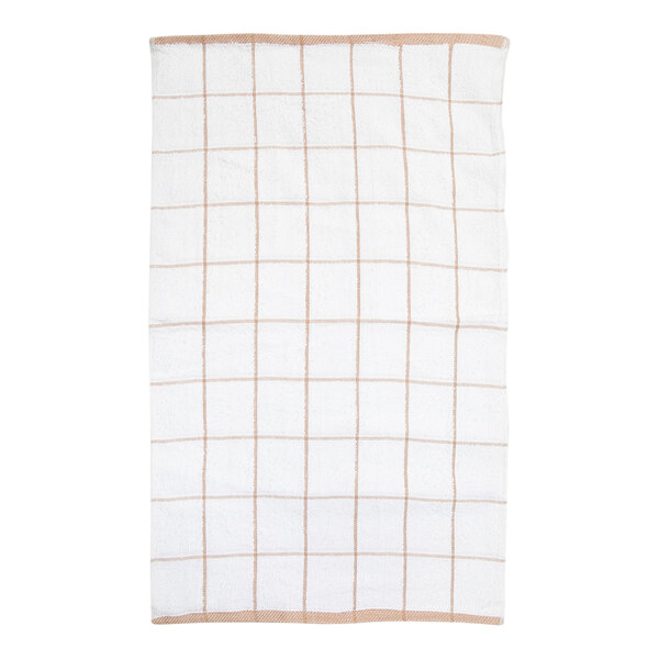A white rectangular towel with a tan windowpane grid pattern and tan edging.