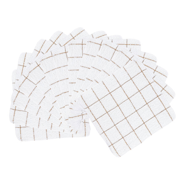A set of white square cloths with a tan windowpane pattern, fanned out in a semi-circle.