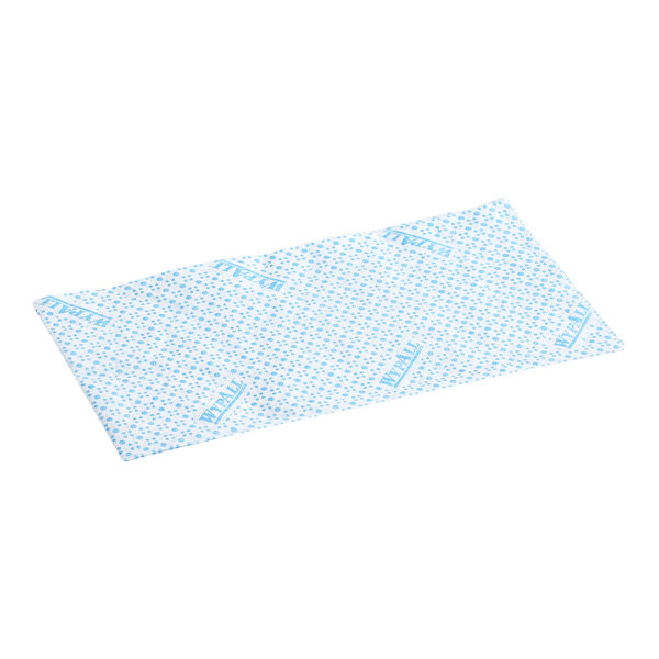 A rectangular blue foodservice wiper with a patterned design and WypAll branding.