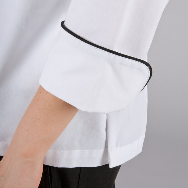 The Chef Revival ladies white executive coat with black piping on the sleeve.