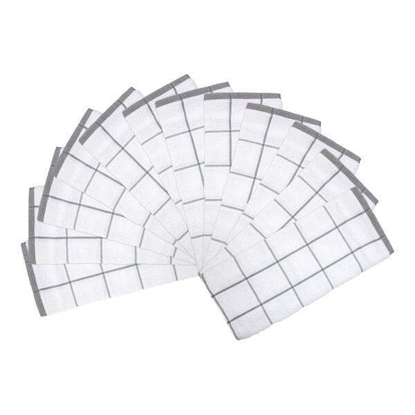 A set of twelve white towels with a gray windowpane pattern, arranged in a fan shape.