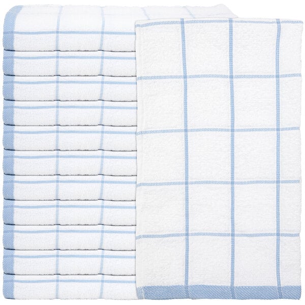 A stack of blue and white towels with a checkered pattern.