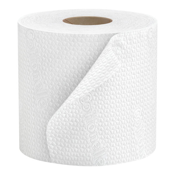 A roll of Cottonelle Professional toilet paper on a white surface.