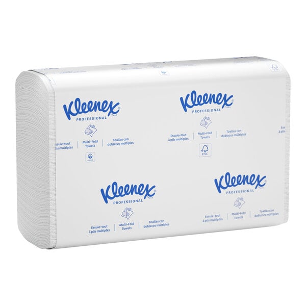 A stack of white multi-fold paper towels wrapped in branded Kleenex Professional packaging.