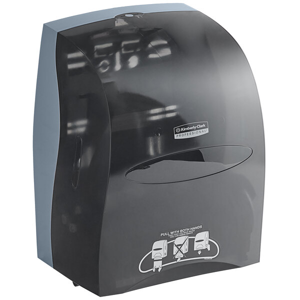 a black and grey paper towel dispenser