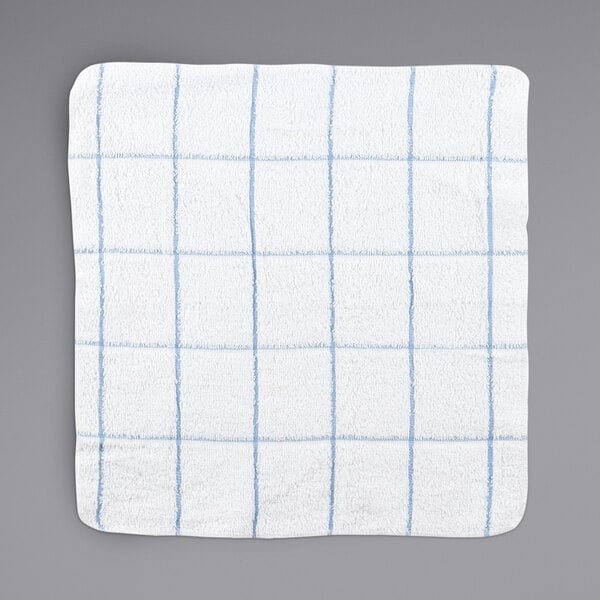 a white and blue plaid towel