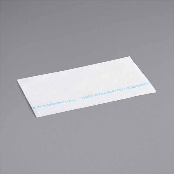 A white WypAll envelope with blue text.