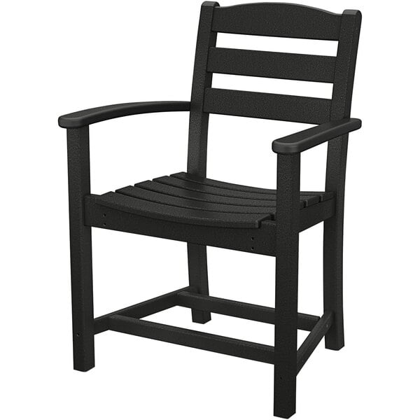 A black plastic chair with a wooden back.