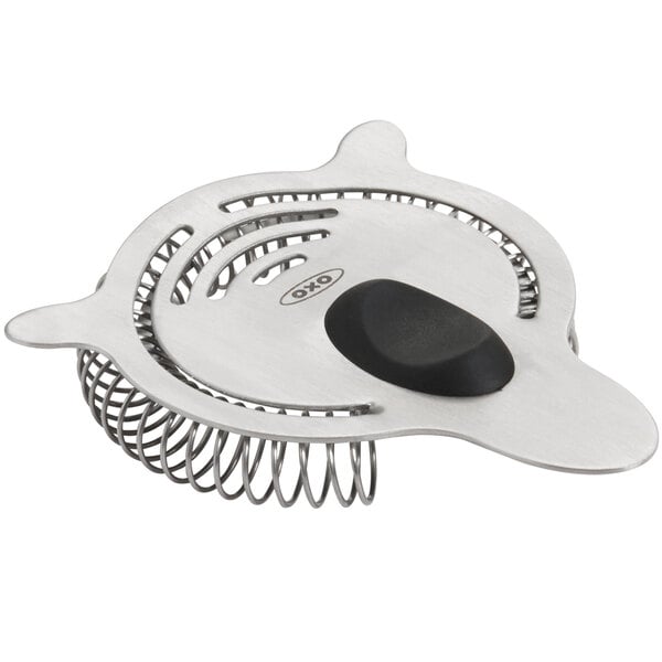 An OXO stainless steel cocktail strainer with black accents.
