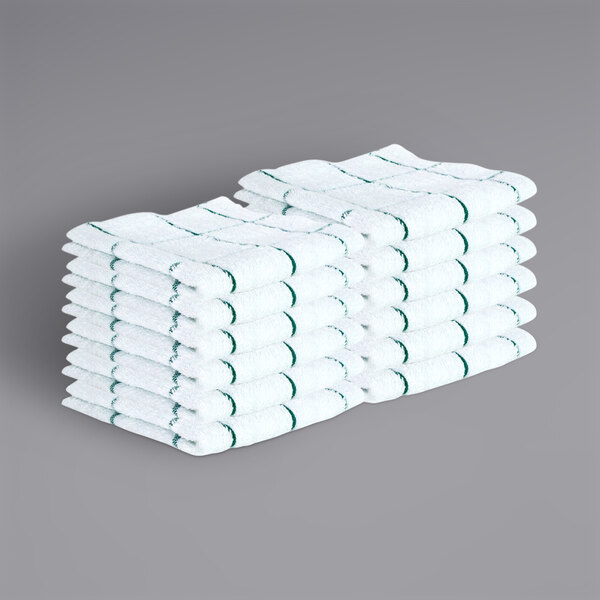 A stack of Monarch Brands green windowpane pattern towels with white stripes.
