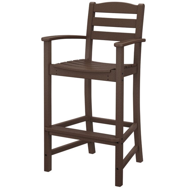 A mahogany POLYWOOD La Casa Cafe bar chair with armrests.