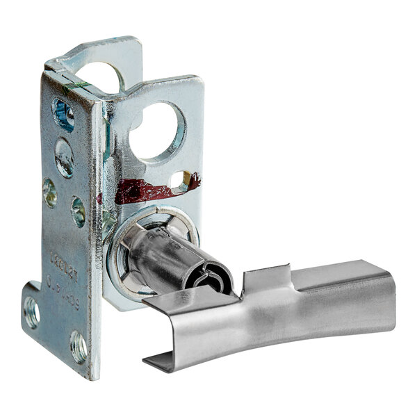 A metal piece with a metal handle, a pilot light for natural gas fryers.